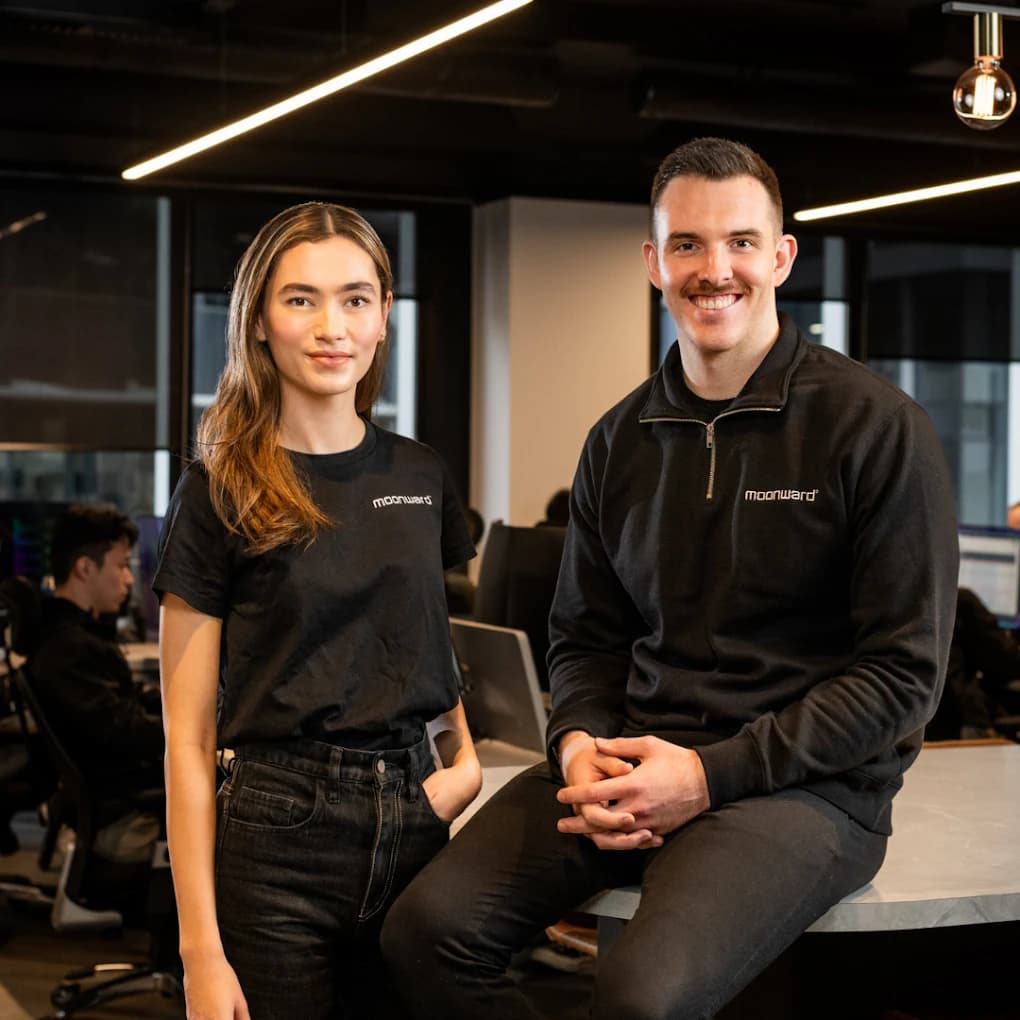 Two members of the Moonward team in the Brisbane office